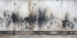 © Haseeb - Dark smoke stains and burn marks on a concrete wall surface with gritty urban texture