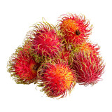 Close-up of a vibrant pile of fresh rambutan fruits against a dark background