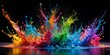 © Md Saiful - Vibrant rainbow colored paint splashes bursting against a dark black background