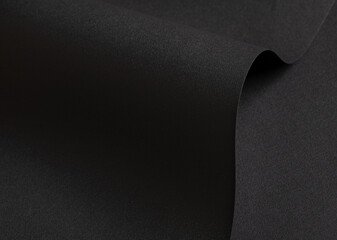 Poster - Black velvet-textured paper with a matte finish, featuring smooth, wavy folds and edges. Premium,