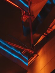 Poster - Modern architectural detail with vibrant neon reflections highlighting sharp angles and dynamic lines in a contemporary urban environment