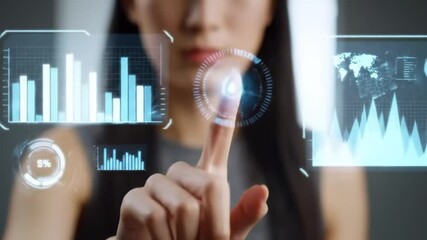 Poster - Asian Woman Interacting With Blue Data Charts On Holographic Display With Muted Background In A Data Driven Technology Environment