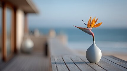 Poster - Elegant Bird of Paradise Flower in Minimalist Vase on Wooden Table With Coastal Light