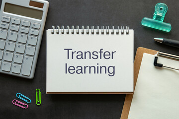 Poster - there is notebook with the word transfer learning. it is as an eye-catching image.