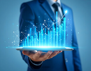 Poster - Businessman displays upward trending graph on tablet