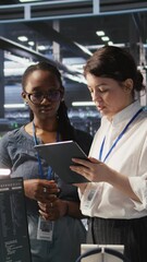 Poster - vertical video teamworking engineers in data center integrate ai automation tools together during ma