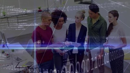 Poster - coworkers clustering around tablet in open-plan office, displaying binary code and glowing lines