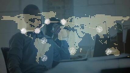 Poster - Colleagues analyzing network data in technology office, displaying transparent world map overlay