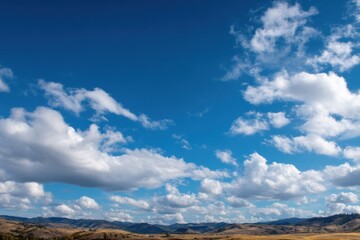 Poster - Rolling Hills Under a Blue Sky With Puffy Clouds, Representing Natural Beauty and Peaceful Scenery for Travel and Outdoor Adventure : Generative AI