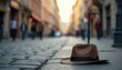 © Marika - Busker's hat and instrument stand deserted on city street, background, music