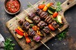 © Igor - Grilled beef skewers with vegetables top view