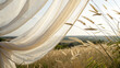 © Naruedetch - Soft, flowing curtain fabric with golden grasses swaying in the gentle breeze, creating a serene outdoor ambiance ideal for nature photography and peaceful scenery