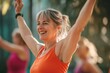 © Anna - Energetic mature woman dancing in Zumba class