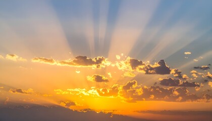 Poster - _Skyscape of sun with golden rays of light from behind clouds at sunrise.