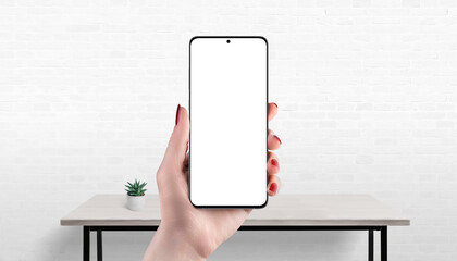 Leinwandbilder - Smartphone mockup in hand with isolated screen, office desk in background, ideal for showcasing app, website, or online shop