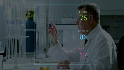 Poster - senior male scientist touching holographic waveform graphs showing vital signs in lab