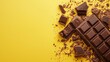 © Juan - Chocolate chunks on bright yellow surface for food photography scene setup composition sweet bold contrast dessert bar indulgent break