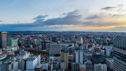 Leinwandbilder - 朝焼け・夕焼けの都市と青空のタイムラプス