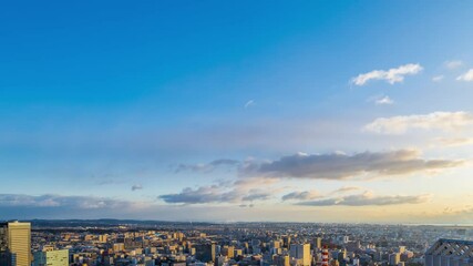 Leinwandbilder - 朝焼け・夕焼けの都市と青空のタイムラプス