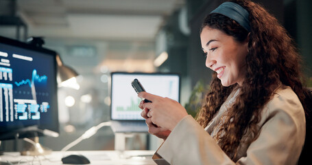 Fototapete - Business, night and woman with smartphone, smile and professional with investments. Evening, person and investor in workplace, cellphone and charts for profit growth, email and app for stock market