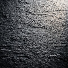 Poster - Textured Dark Stone Surface with Highlight, Creating a Dramatic and Raw Artistic Expression