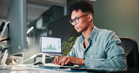 Poster - Man, typing and computer with trading, graphs and review for revenue report in office at company. Person, keyboard and statistics at night, charts and research with info for stock market at agency