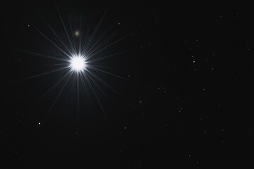 Wall Mural - Bright starburst in dark night sky