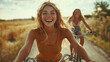 © ganlaya - friends laughing while riding bikes through a countryside road