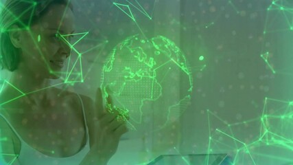 Poster - Middle-aged woman touching green holographic globe at tech workspace, displaying network nodes