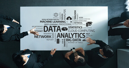 Poster - a group of business professionals engaging in a strategic discussion centered around data analytics,
