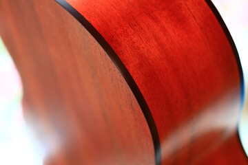 Poster - A detailed view of a guitar with a blurred out background