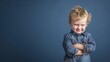 © Elbowpain - portrait of a child wearing denim shirt.