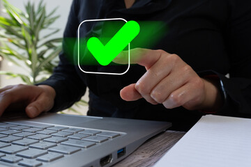 Poster - Close-up of businesswoman hands pointing at green check mark icon in square frame