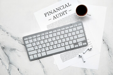 Poster - Computer keyboard, earphones, financial documents and cup of coffee on light background