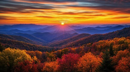 Wall Mural - Scenic autumn mountain vista with a brilliant sunset. Use it for travel, nature, or seasonal concepts.