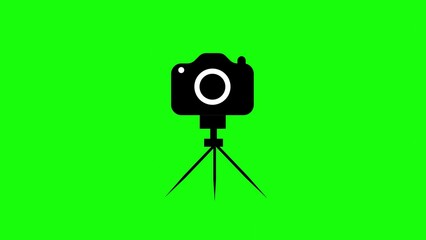 Fototapete - A black and white camera on a tripod against a vibrant green backdrop perfect for photography and video concepts and themes