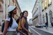 © bernardbodo - Tourists walking down street in lisbon, portugal, exploring city center