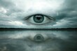 © choirun - A large eye positioned over a serene lake reflecting the sky.