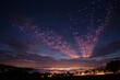 © Pech - A drone show forming patriotic shapes in the night sky