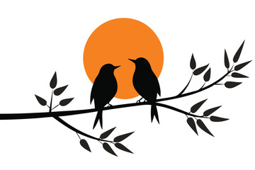  Two black birds are perched on a branch against the orange sun backdrop