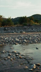 Wall Mural - Rural Countryside Landscape In Calabria With Slow Flowing River At Sunset