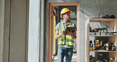 Poster - Building, tablet and walking with construction worker man on site for civil engineering or development. Checklist, inspection and planning with developer person on location for project management