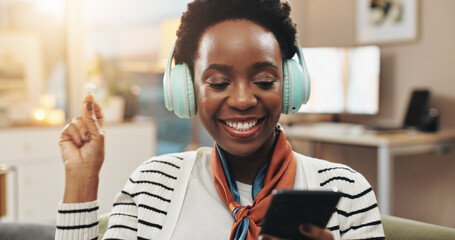 Poster - Phone, black woman and dancing with headphones in home for music playlist, audio album and streaming subscription. Dancer, happy and smartphone for social media video and listening to podcast on sofa