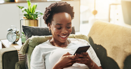 Aufkleber - Black woman, happy and typing with phone in home for text message, dating site and social media scroll. Relax, person and internet connection on sofa for streaming service, reading ebook and research