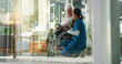 © peopleimages.com - Women, nurse and mature patient in wheelchair at retirement home for healthcare, support and checkup. Caregiver, person with disability and tablet for medical service, physiotherapy and discussion
