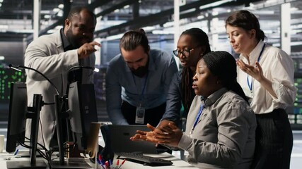 Poster - Angry technicians in server room fighting each other after encountering critical error popup during maintenance. Engineers having tense conversation, doing system recovery brainstorming chat, camera A