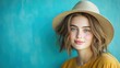 © Koh's Smart - the portrait features a young woman with a playful expression, wearing a hat tilted to the side and posing against a vibrant blue background, exuding a sense of fun and lightheartedness.