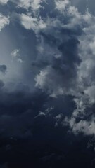 Wall Mural - Lot of lightning during a thunderstorm. Storm clouds are moving fast on the viewer, timelapse. Vertical video