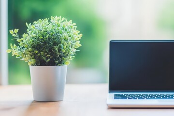 Poster - A Modern Laptop Computer Resting on a Rustic Wooden Table Surrounded by a Cozy and Inviting Workspace Atmosphere with Natural Light Streaming In