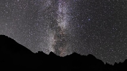 Wall Mural - beautiful night sky time lapse with milky way galaxy over the mountains. night tight landscape starr